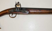 Replica flintlock pistol with axe handle