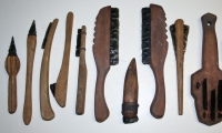 Primitive weapons and tools with obsidian blades.