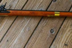 Non-firing replica Kentucky Flintlock rifle.