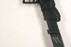 Non-firing replica Glock with extended magazine