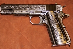 moviegunguy.com, movie prop guns, handgun, semiautomatic, Replica Engraved, Chrome Colt 1911 blow-back gun.