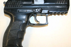 Non-firing replica Heckler-Koch 9mm pistol.