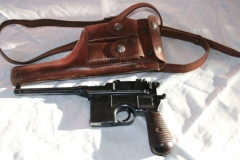 moviegunguy.com, movie prop handguns, semi-automatic, broomhandle mauser and holster