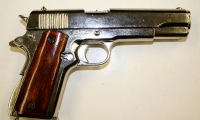 moviegunguy.com, movie prop handguns, semi-automatic, replica chrome 1911