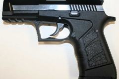 Non-firing replica two-tone 9mm pistol