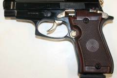 Non-firing replica Taurus .380 automatic compact
