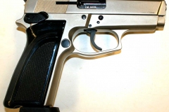 Non-firing replica brushed chrome 9mm pistol.