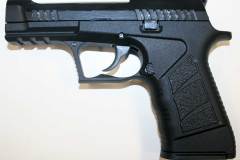 Blank-firing black 9mm auto compact