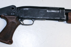 moviegunguy.com, movie prop shotguns, Non-firing replica 12 gauge Pump Shotgun with folding stock.