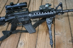 Non-firing replica M4 assault rifle with scope and bipod